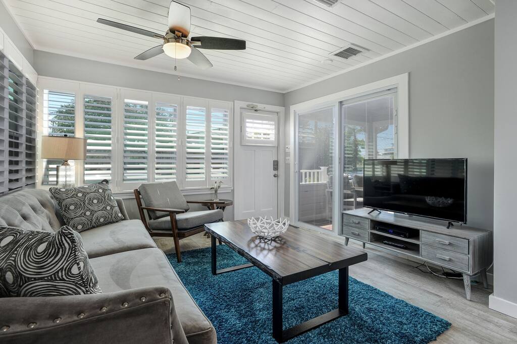 View from the kitchen to the open living area. Covered porch is thru the sliding glass door.