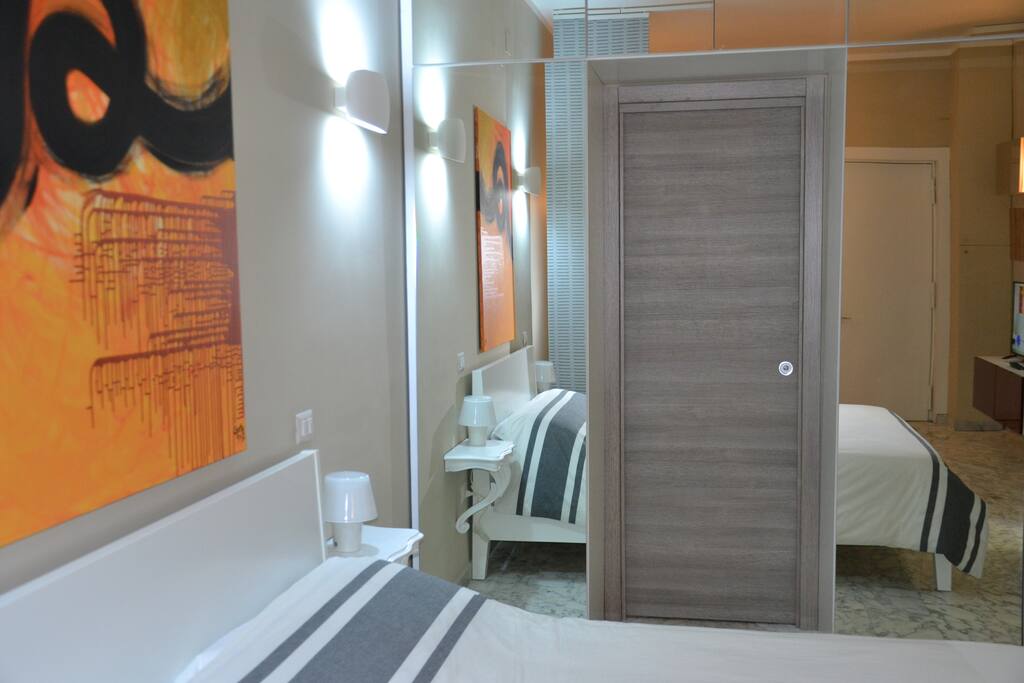 zona letto con armadio
