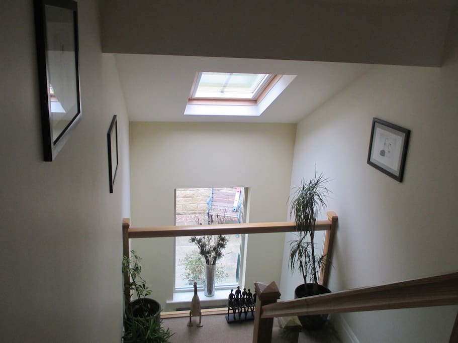 Balcony and landing leading up to floor 2 main living space