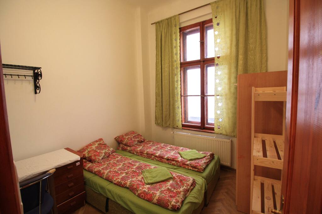 bedroom B , 2 beds ,writing desk, wardrobe, shower unit , ideal for couples