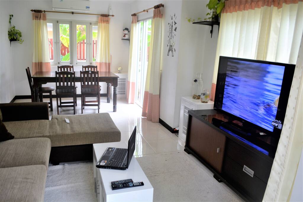 Living room with 55inch LCD and full cable package