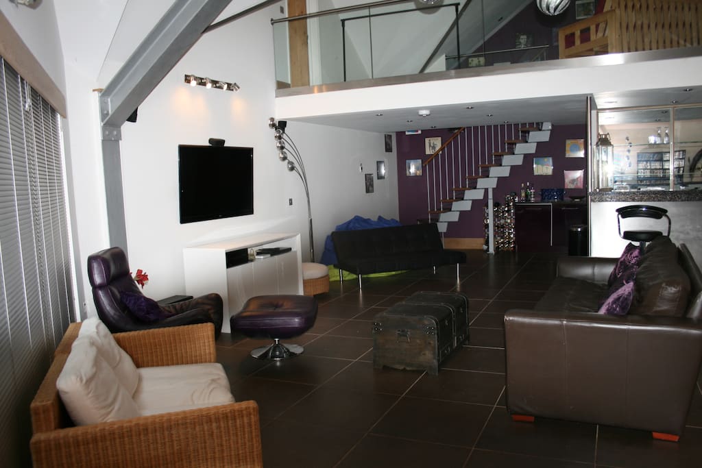 Main living area with 55inch Smart TV