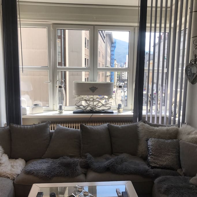 Livingroom with view to Torgallmeningen and possibility to "shut down" with lamells/markise