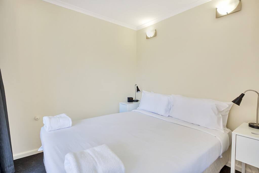 Separate bedroom, opens to the balcony.