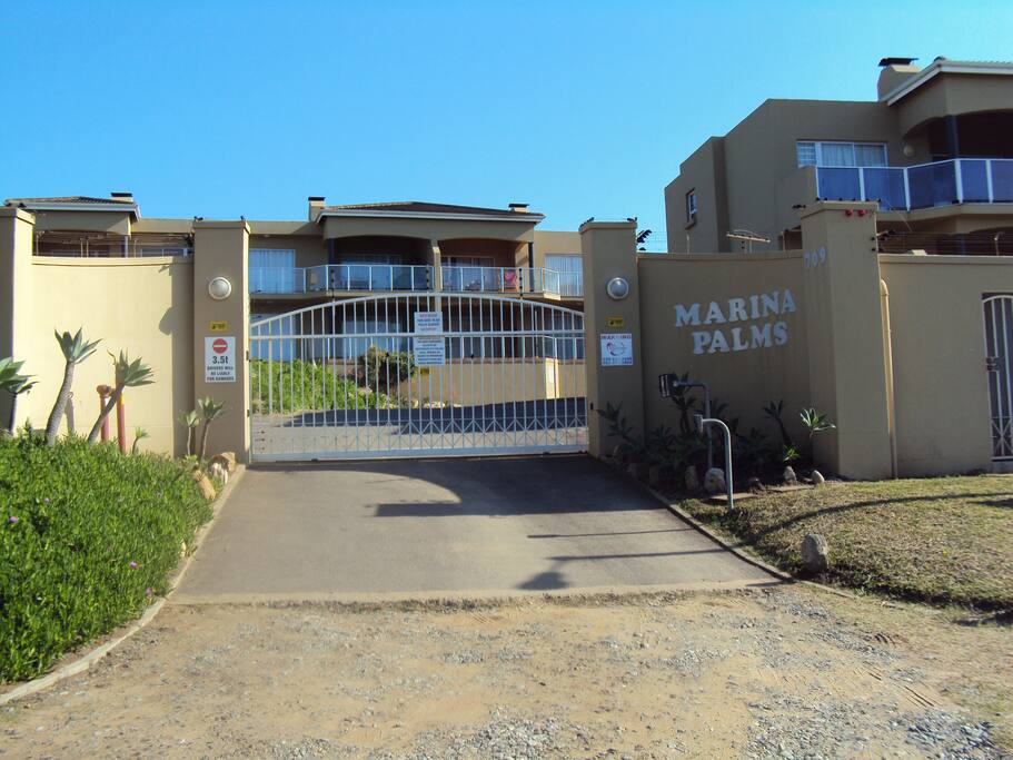 Entrance to marina palms