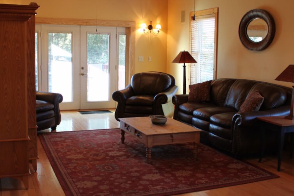 Guests share a large living space with outdoor deck.