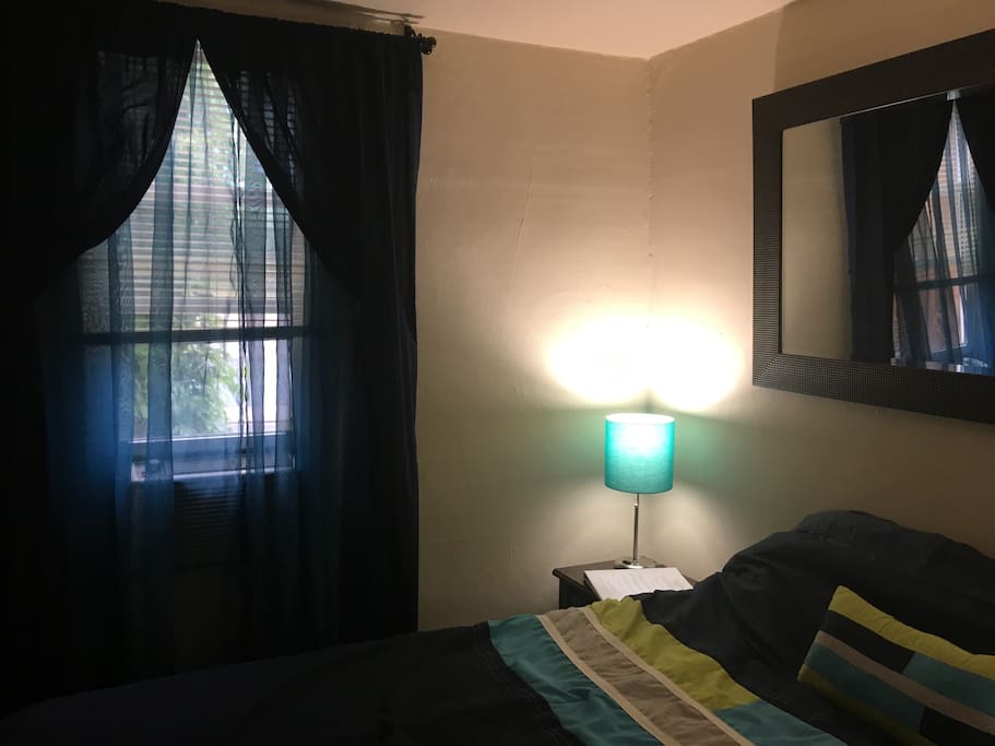 Window with personal AC unit.