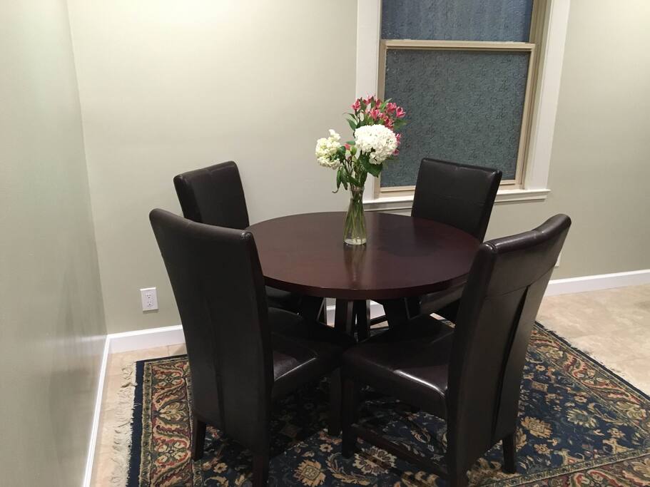 Dining table with comfortable leather chairs