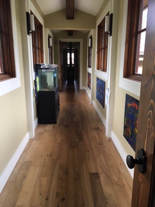 2nd floor bridge separating living area above garage from rest of house.