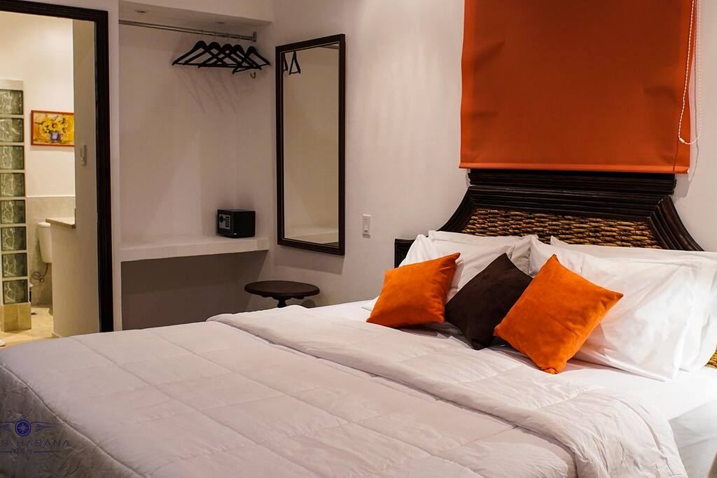Room 2: hangers, safe box, private bathroom