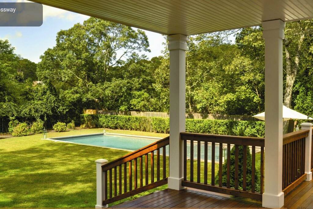 Outdoor dining area view of 20 by 40 heated pool