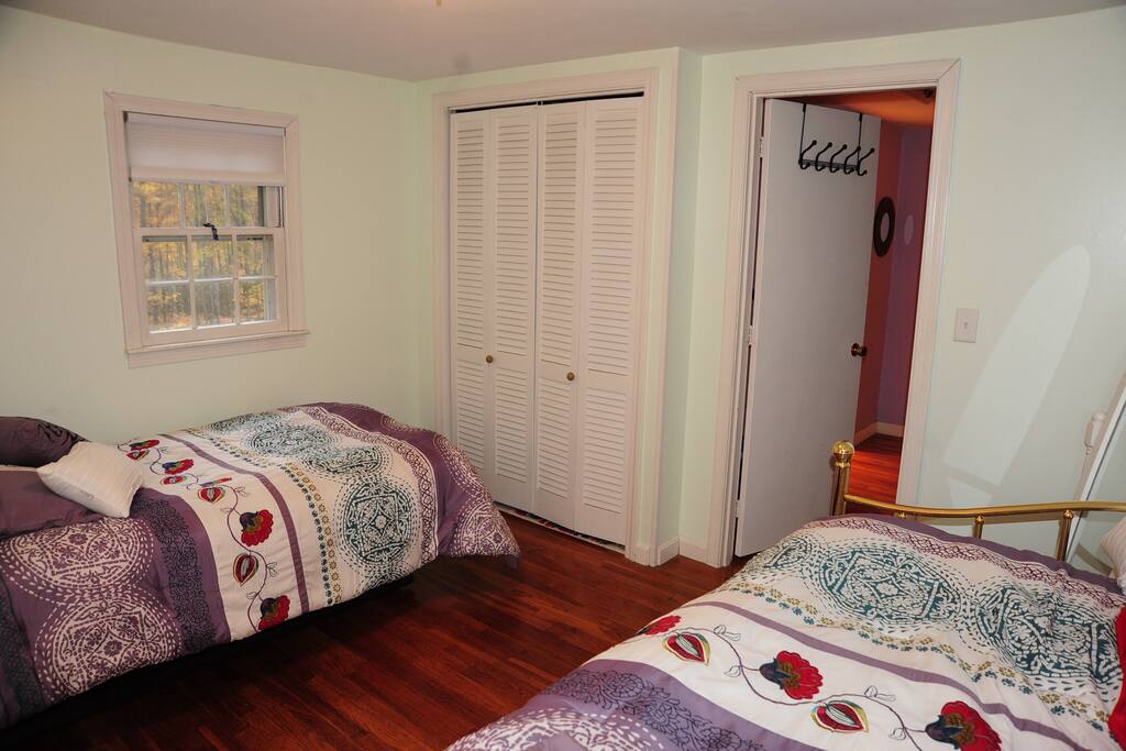 The bedroom looking out the door