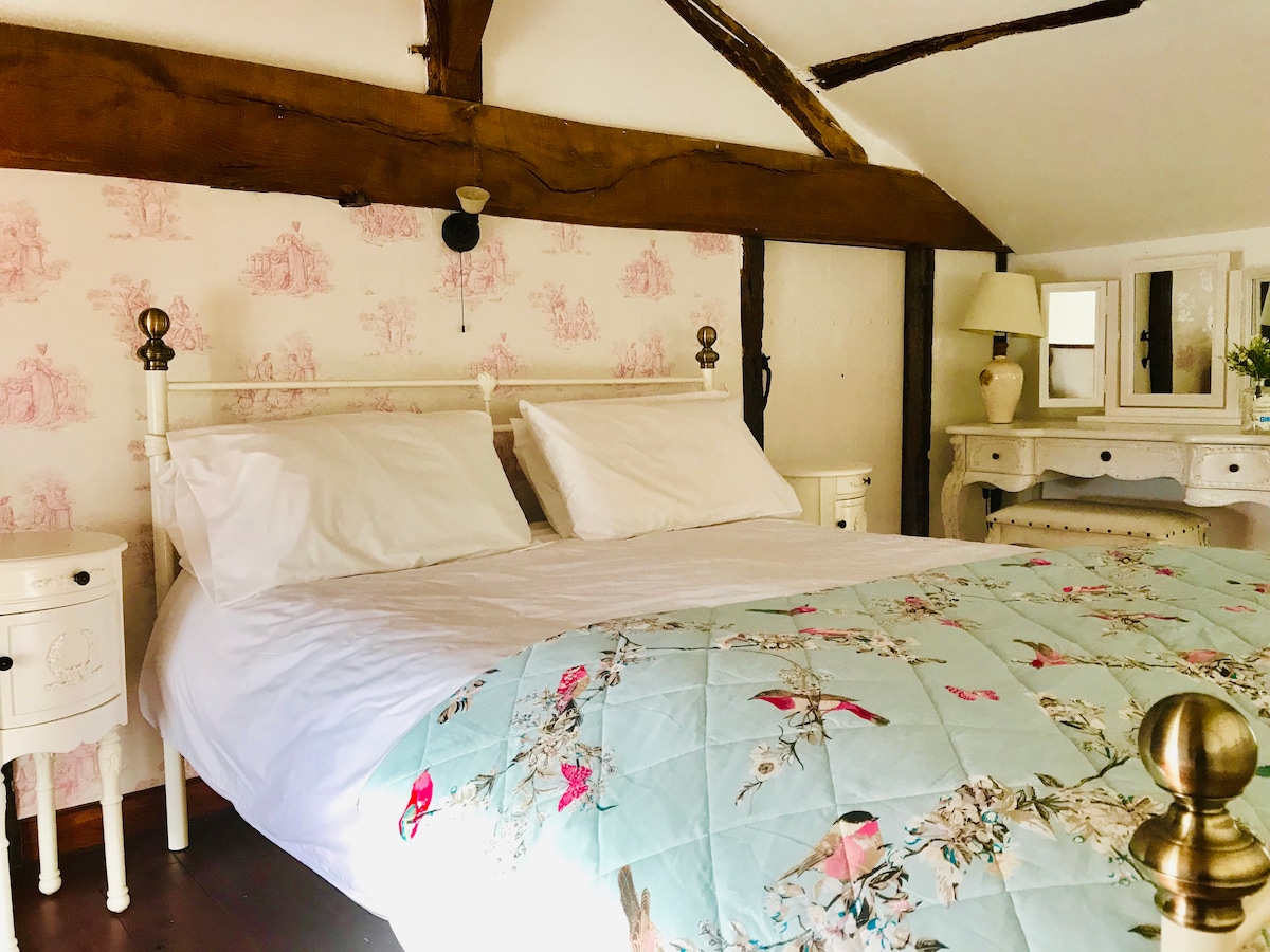 La Blatière, de hoofdslaapkamer van de boerderij met en-suite 