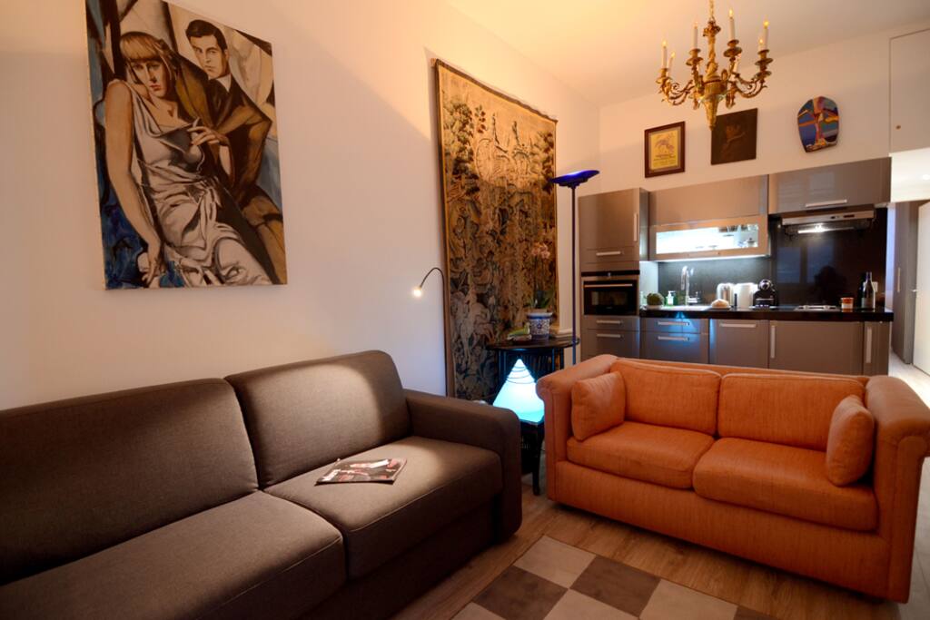 Comfortable sofas and modern artwork