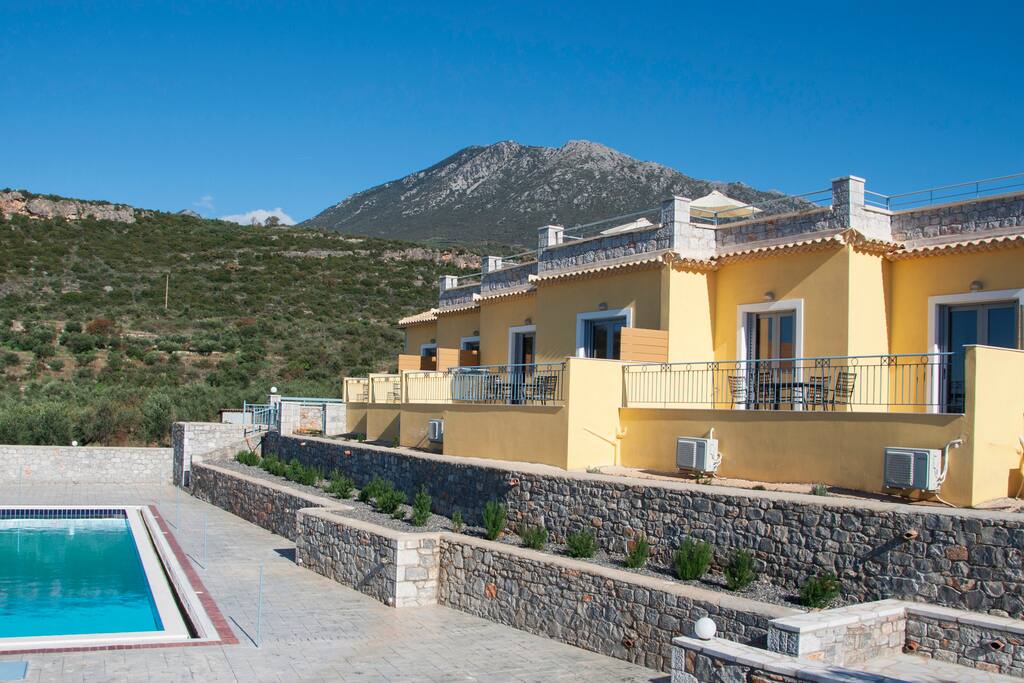 exterior view that during the summer has more than 20 outdoors umbrellas for extra shade