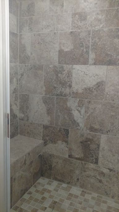 Tile walk in shower with bench seat