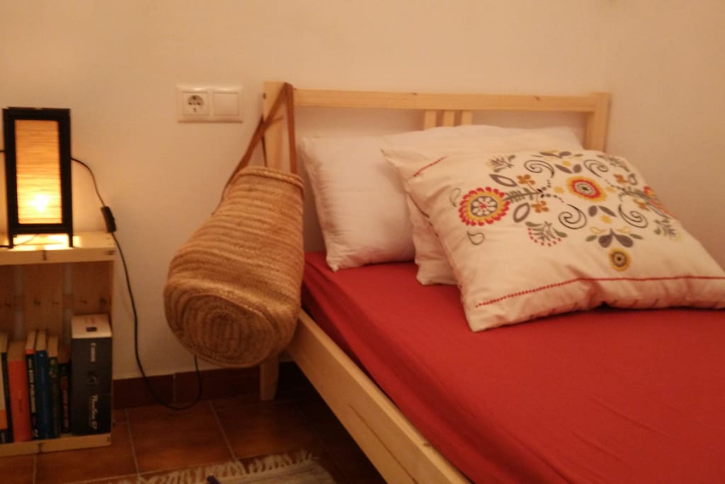 Nordic duvet and organic wood boxes to store your stuff.