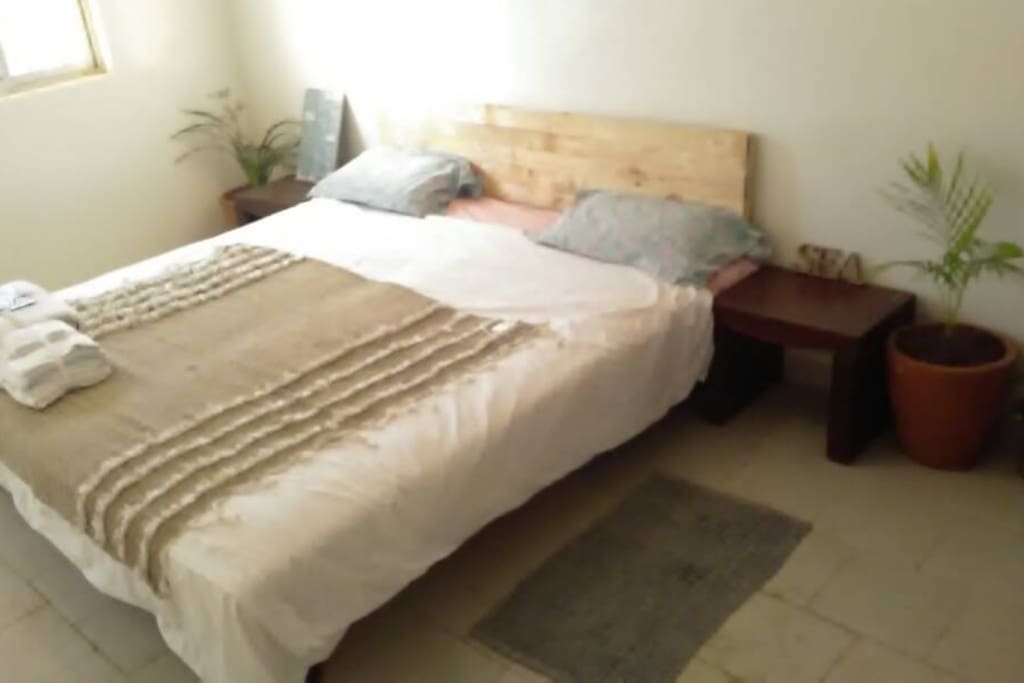 This room is a studio for two people with private bathroom and kitchen, and there are two more rooms available with single beds, and ensuite bathrooms.