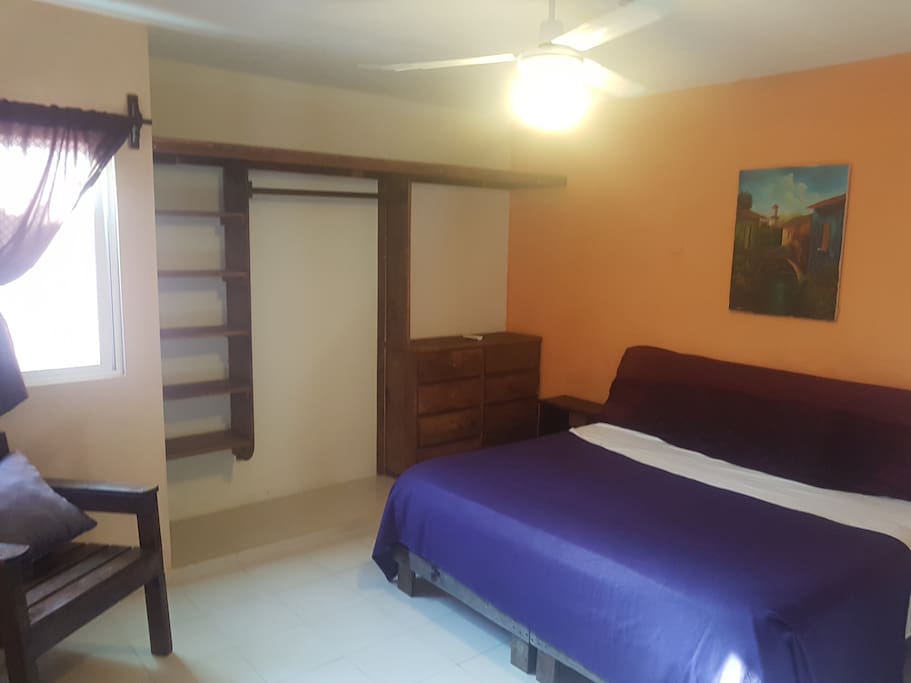 Large spacious bedroom with king bed