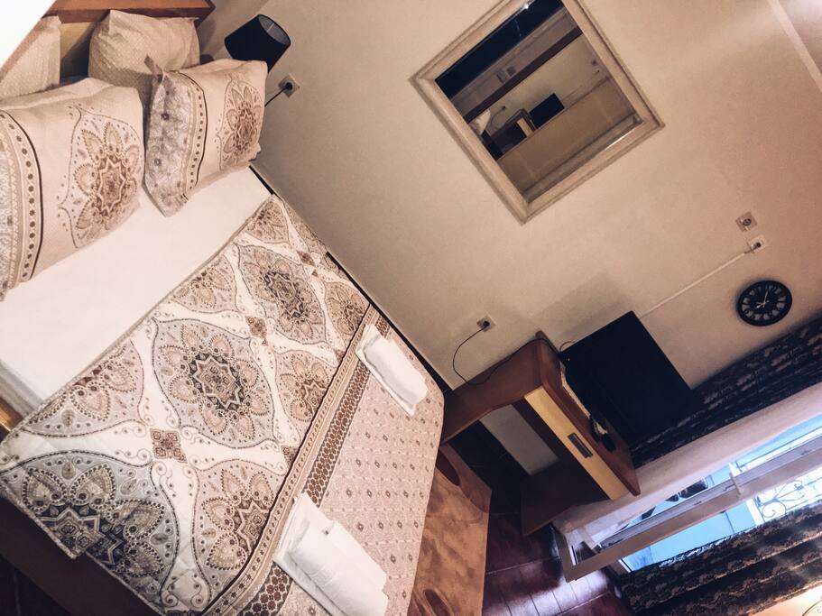 Queen Size Bed in Modern Room