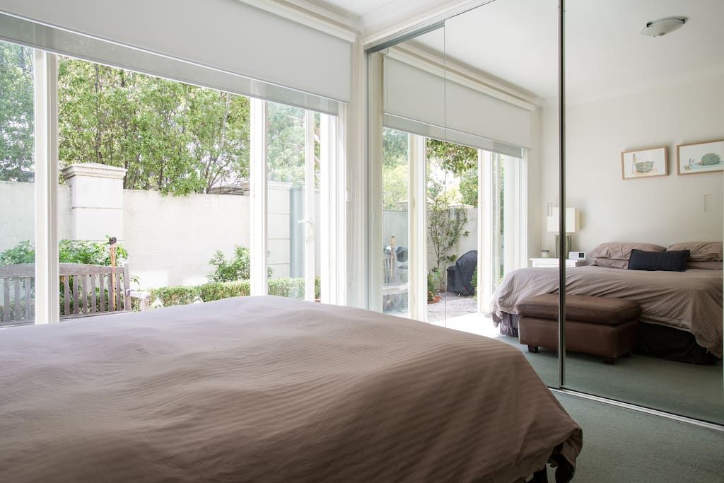 Bedroom with beautiful natural light & opening on to the courtyard