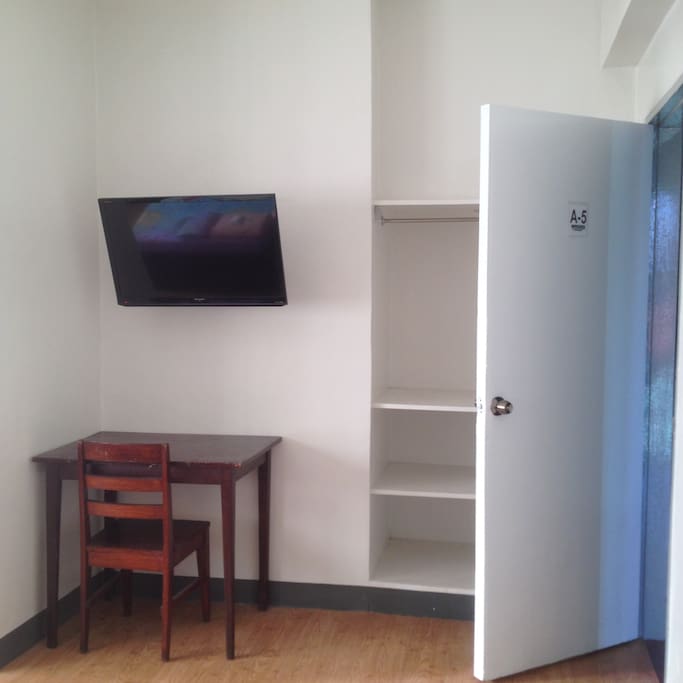 laptop area, 32 inch flat screen tv and closet space