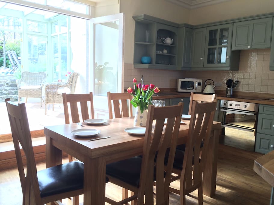 Bright and airy kitchen opening out onto garden room