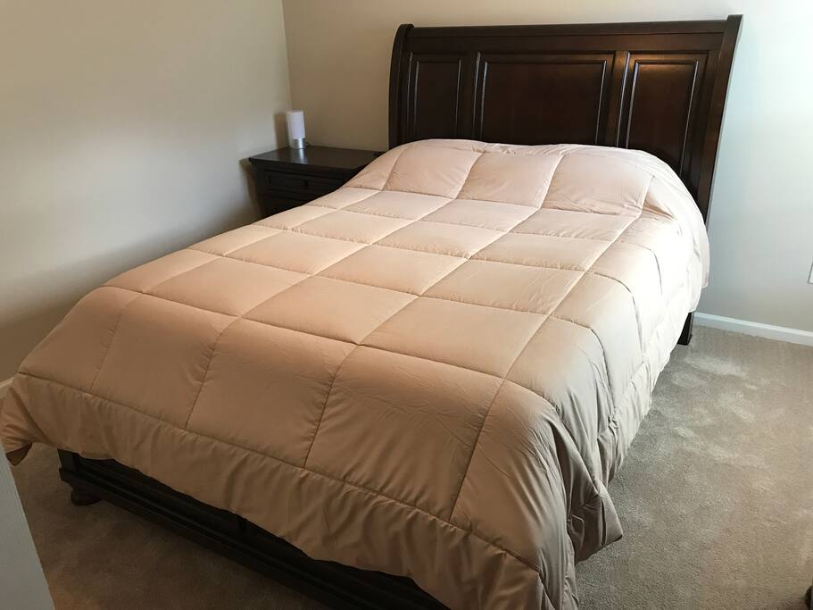 Private bedroom with nightstand and dresser