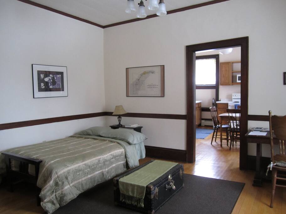 Living room with futon opened as bed