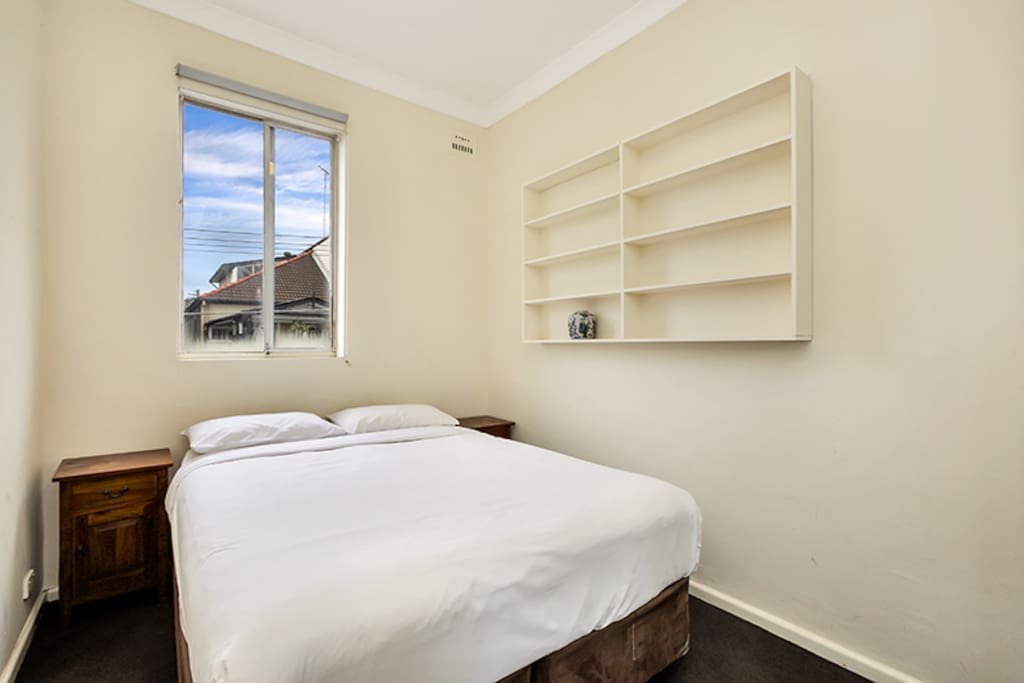 Main bedroom with Queen sized bed & built-in wardrobe