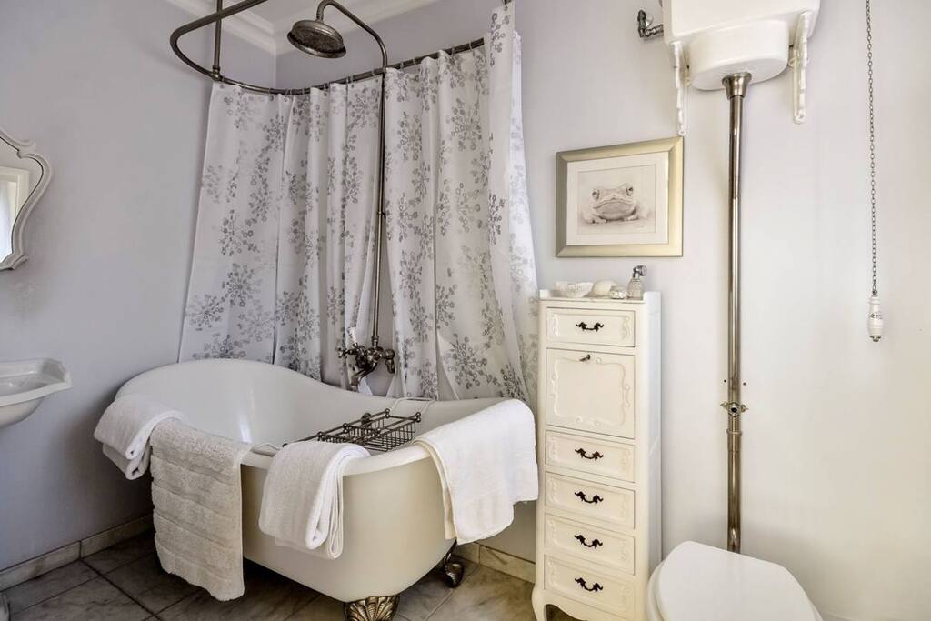 En-suite bathroom with tub & shower