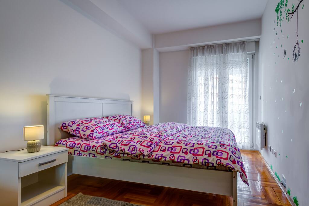 Dim the lights in the bedroom for a relaxed atmosphere.