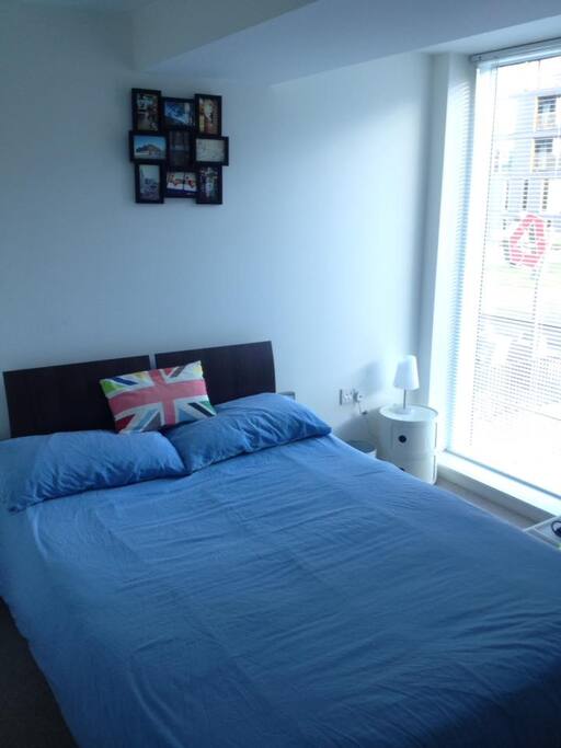 Master bedroom with queen sized bed.
