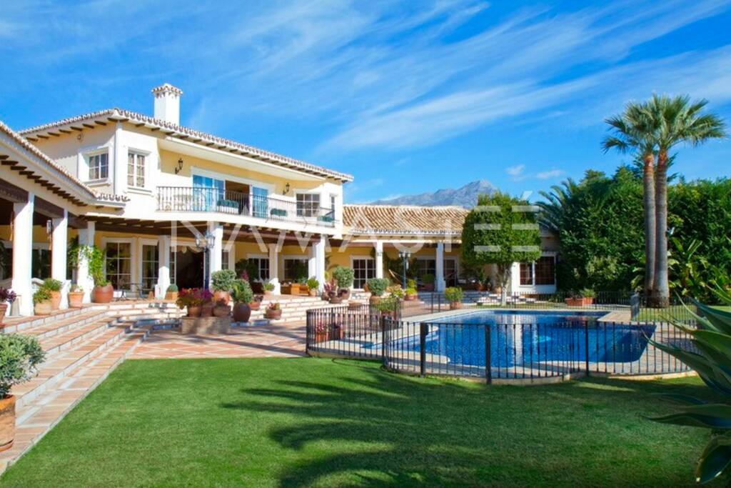 Stunning outside area - The fence by the pool has been removed. We are providing new photos