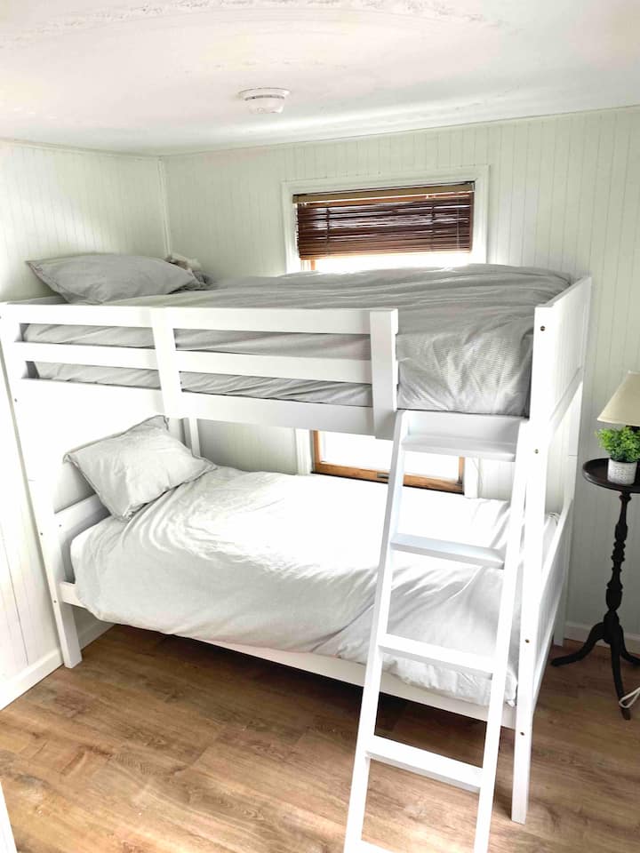 Twin over twin bunk bed. Brand new mattresses as of 2022. Can accommodate up to 200 lbs per bunk. River views.
