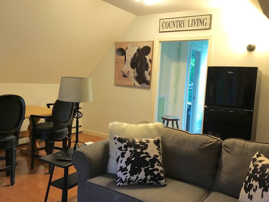 Dining area and kitchen entrance from living room.