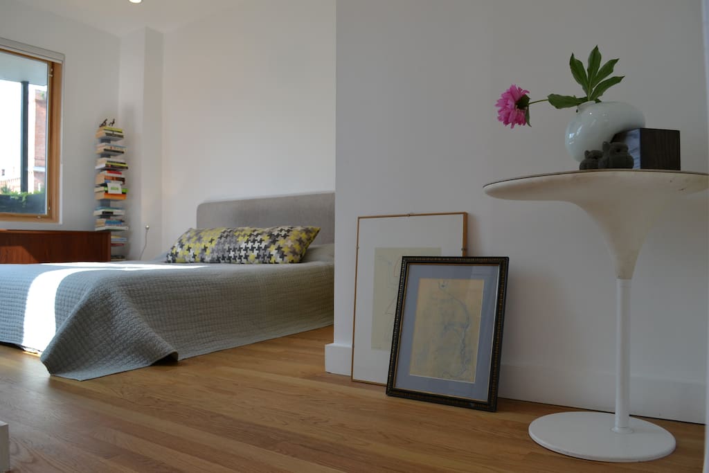 Master bedroom with natural latex mattress and walk in closet
