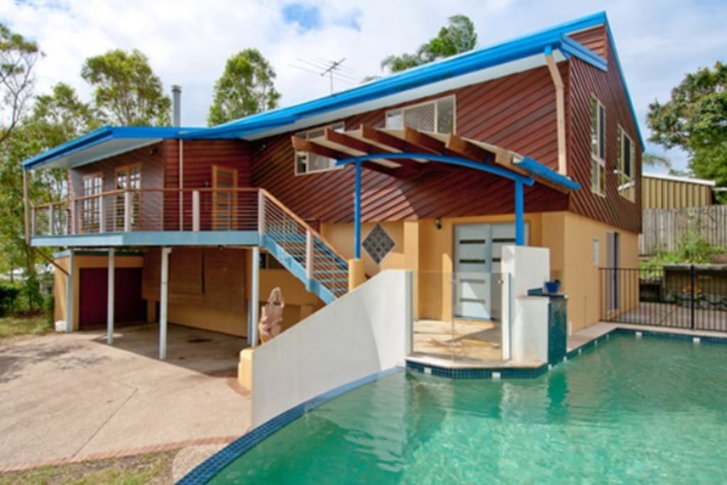 Downstairs (yellow part of the house) is yours. Front blue door is your access. Side door gives you direct access to pool.