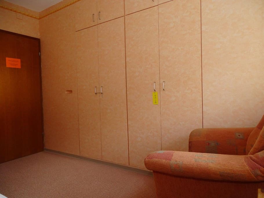 Cupboard,armchair,orange room