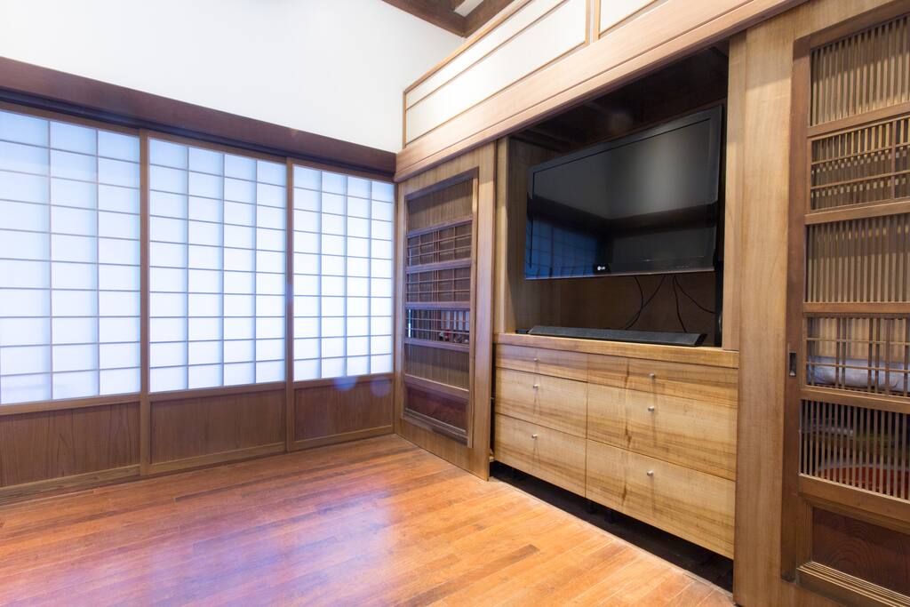 Master bedroom with media center equipped with Apple TV.