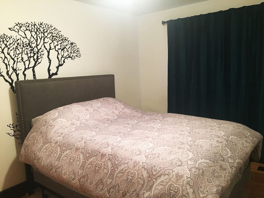Private guest bedroom with queen sized mattress and memory foam topper.