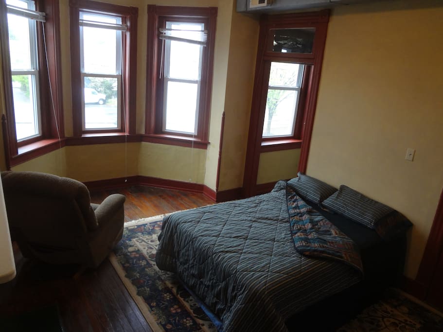 Bed, lazyboy, bay window