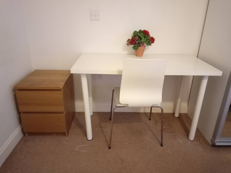 Worktop with chair and bedside table