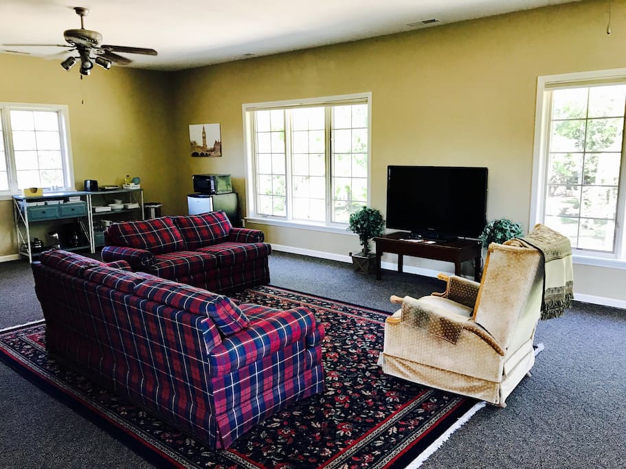 Clean and comfortable furniture and a large flat screen TV with premium channels.