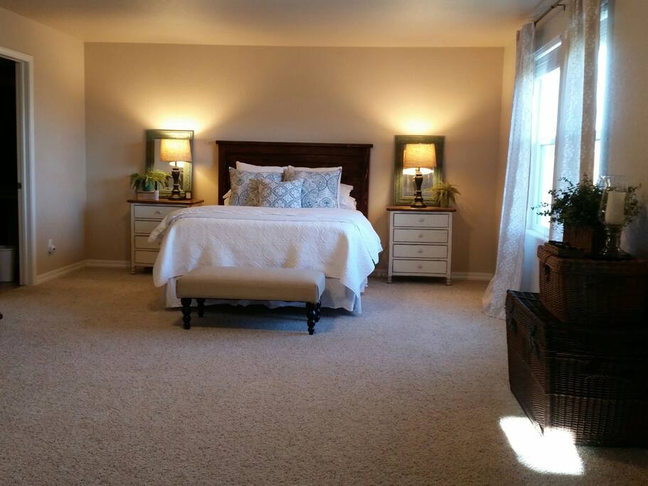 Spacious bedroom with mountain views
