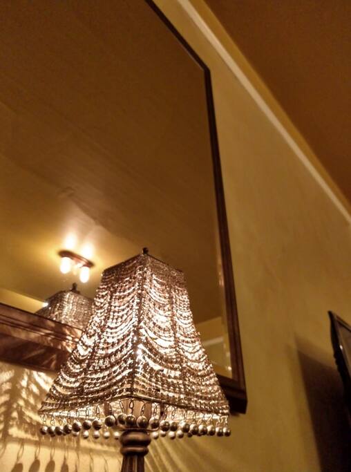 Large wall mirror in bedroom