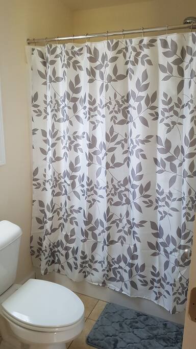 Private Full Bath with Bathtubub, Toiletries, Toiletries Holder & Removable Shower Head Provided
