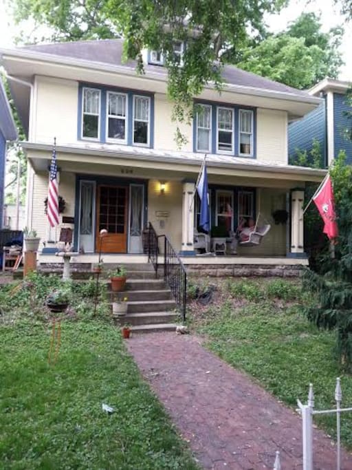 Front of our house with front porch swing.