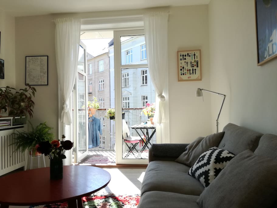 From the living room you can access the balcony - our favorite spot during summer. On the balcony you can enjoy the sun and follow the life in street below.