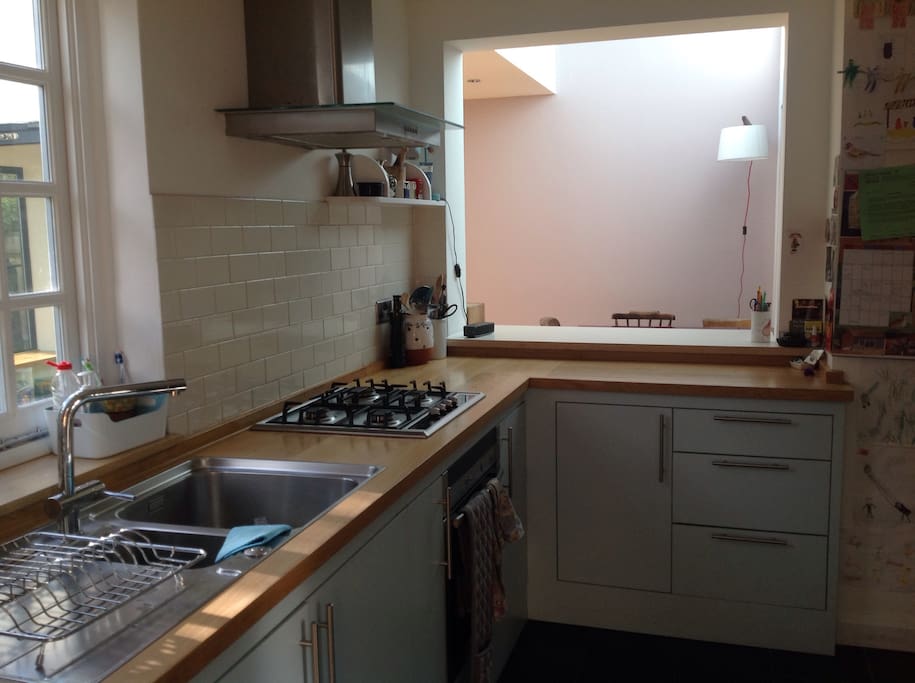 Kitchen, looks through to open plan dining room and living room